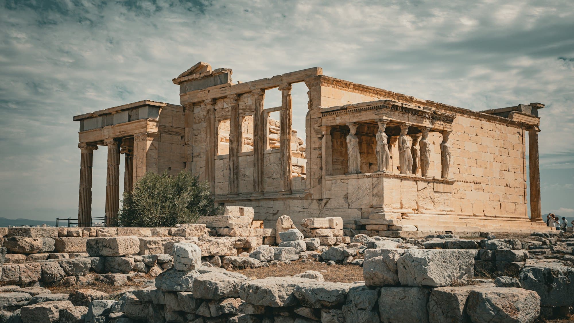 Ancient Greek temple columns against an open sky